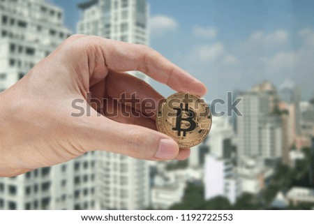 hand holding the bitcoin and blockchain network connection with city background, virtual currency blockchain technology concept.
virtual currency blockchain technology concept.