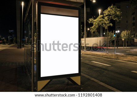 Light box for advertising with white blank space at bus stop. Night mock-up design concept. Horizontal