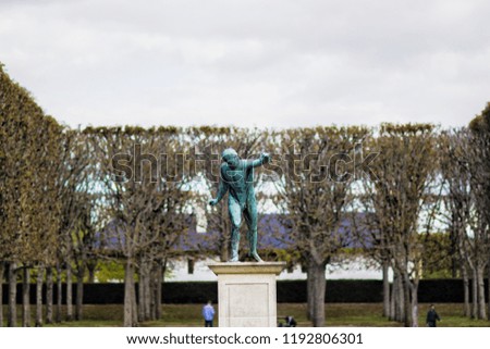 I called it In Motion. On a photo is a particular statue of a man, that seems mors in motion than people next to it. Can be perfectly used as wallpaper, background, etc. Was taken in Paris, France.
