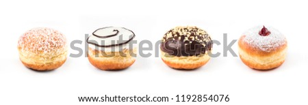 Collection of delicious doughnuts side by side isolated on white background, view from side Royalty-Free Stock Photo #1192854076