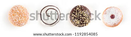 Set of delicious and assorted doughnuts isolated on white background, view from side Royalty-Free Stock Photo #1192854085