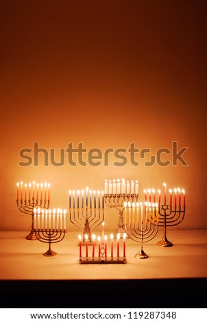 Group of menorahs lit for Hanukkah