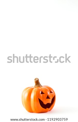 Halloween pumpkin cartoon has a happy face on a white background. There is an empty design theme, Light of the Moon, at midnight.
