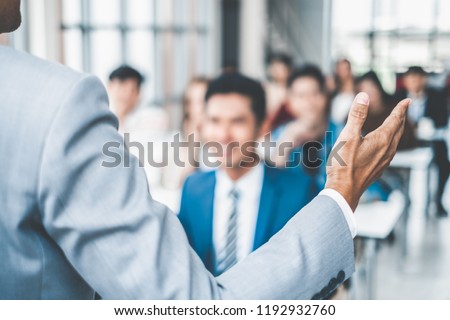 Speaker talking in seminar with many of audiences for business meeting for key of success Royalty-Free Stock Photo #1192932760