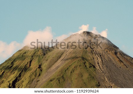 Beautiful shots of mountains, volcano, rainforest, trees, castle and houses in Costa Rica