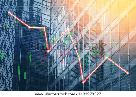 Hong Kong Office buildings with graph index of stock Market (red bear chart)