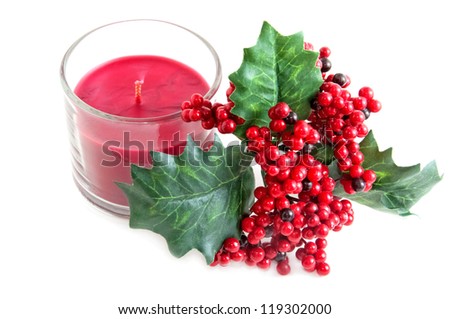 aroma candle and a twig of mistletoe