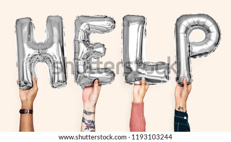 Silver gray alphabet balloons forming the word help