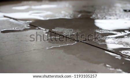 Wet floor close up. it can cause slippery by water.