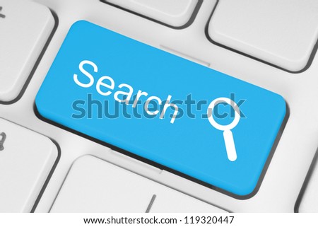 Blue search button on the keyboard close-up Royalty-Free Stock Photo #119320447