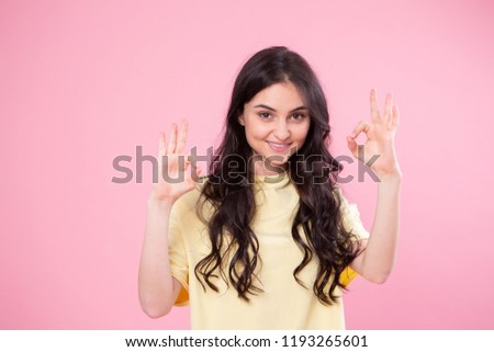 I am princess and number one here! Close up studio photo portrait of pretty lovely coquet charming excited lady making v-sign near eyes looking at you camera isolated bright color pastel background