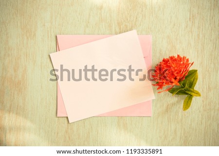 Blank white greeting card with flower. for mockup template. vintage tone.