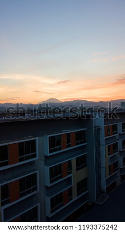 Aerial view of sunrise in Kota Kinabalu City, Sabah Malaysia. View from Cybercity Apartment, Kepayan, Kota Kinabalu, Sabah. Borneo. Malaysia.