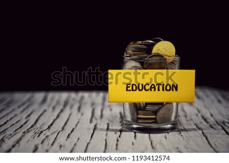 Money saving for education in the glass bottle
