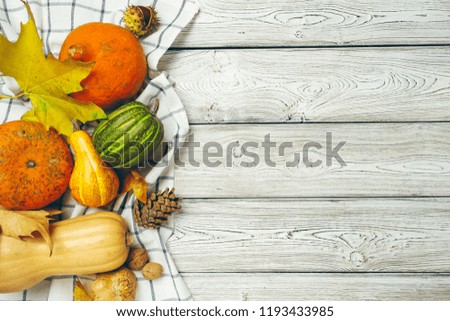 Pumpkin on old rustic wooden table.