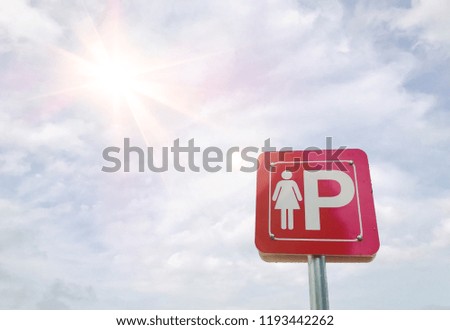 Blurred lady woman parking for car stop sign traffic on blue sky and white cloud