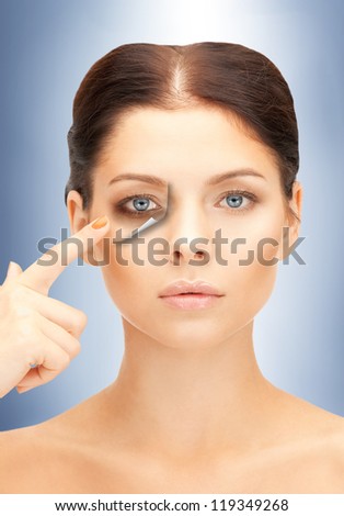 picture of beautiful woman pointing to fatigue