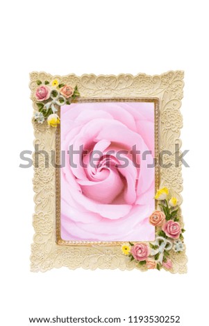 Image of a frame with rose texture around border isolated on white and inside with a pink rose photo