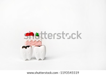 A Piece of Cake Model on Sad Teeth Model Be Decayed Tooth, If You Eat a Lot of Sugar                                 