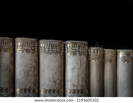 The old books of an ancient library .