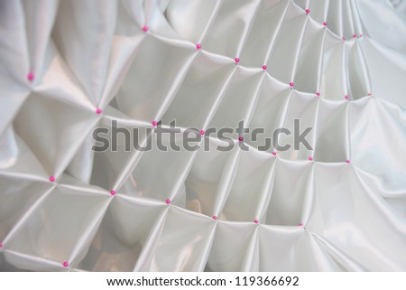 decorative table with white cloth, background