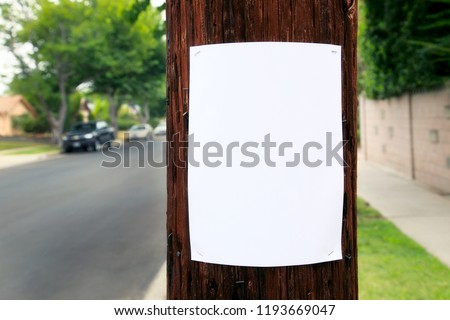 Blank sign posted on a pole Royalty-Free Stock Photo #1193669047