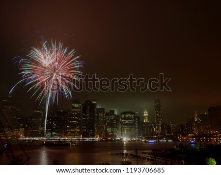 Diwali festival of lights fireworks on East River with Manhattan skyline behind