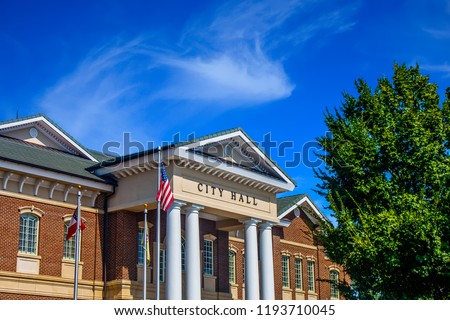 American City Hall Under Blue Sky Royalty-Free Stock Photo #1193710045
