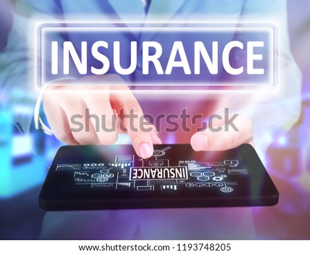 Business Concept. Businessman click insurance button on his tablet. Goals Text typography design