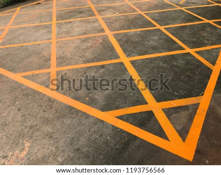 Yellow lines with car parking lot