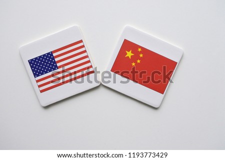 Flags of the United States of America (L) and of the Republic People of China (R)  isolated on a white background. Foreign political business and military relationship.No People. Copy space