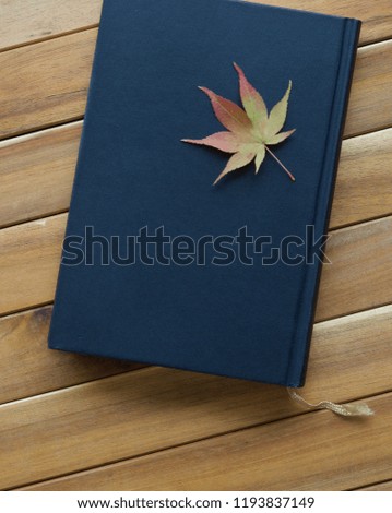 Book and Maple Leaf

