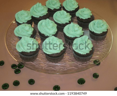 Green Cupcakes on a Glass Plate
