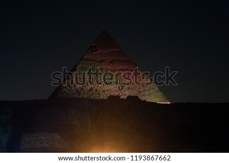 Light painting on the Giza pyramid. Night sky and pyramid in Cairo, Egypt