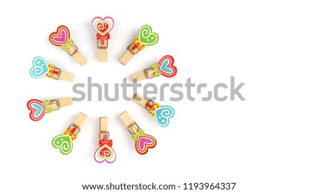 Colorful paperclip made of wood collection of education office supplies, top view close up macro isolated on white background