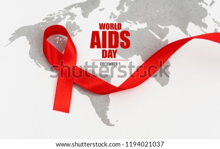 Aids Awareness Red heart Ribbon on world map