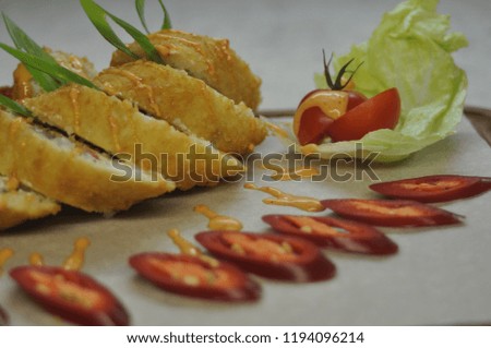 Hot fried Japanese rolls on plate