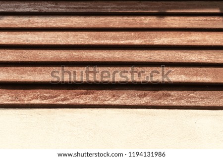 curly brown wooden wall