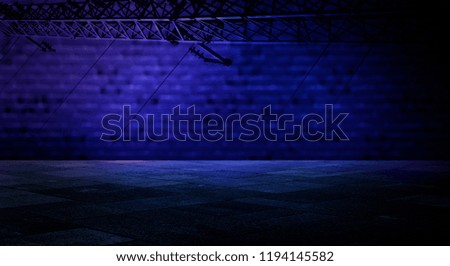 Background of an empty dark room, concrete floor, sidewalk tile, smoke, light from a spotlight