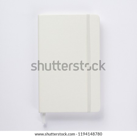 notebook or book on white  background, top view