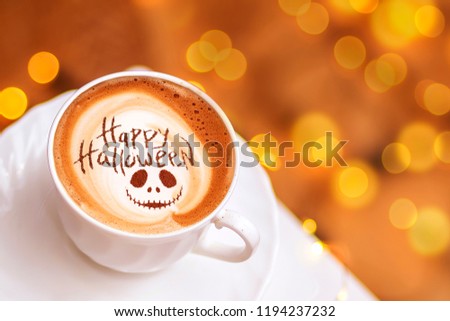 cup of coffee with the inscription happy halloween Royalty-Free Stock Photo #1194237232