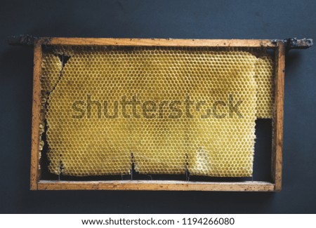Retro picture of an old beehive with a dark background