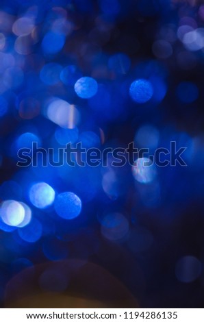 Abstract blue bokeh dark background