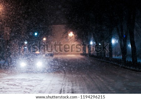snowy street in the evening