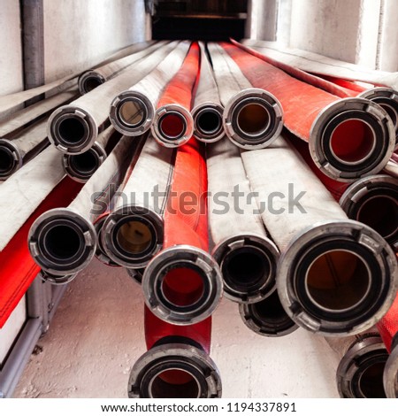 Fire hoses drying after action, rhythmic background
