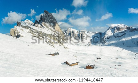 Mountainous panorma landscape. Classic view of famous Seceda mountain peaks in the Dolomites in winter, South Tyrol, Italy