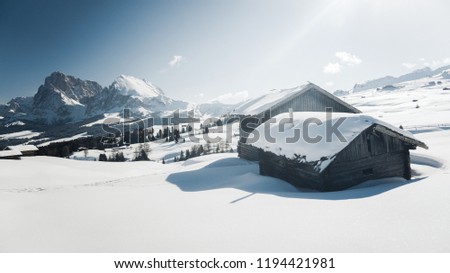 Mountainous panorma landscape. Classic view of the famous Alpe di Siusi mountain resort or Seiser Alm in the Dolomites in winter, South Tyrol, Italy