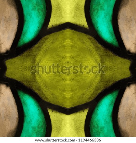 approaching the stained glass in yellow, green and brown colors, with symmetry and reflection effect, background and texture