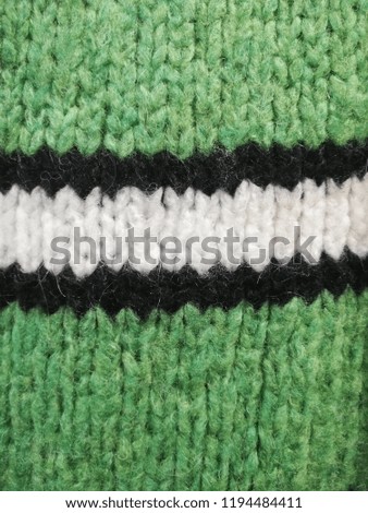 Multicolored knitted background. Knitted texture. Knit wool pattern. Knitting. Background.