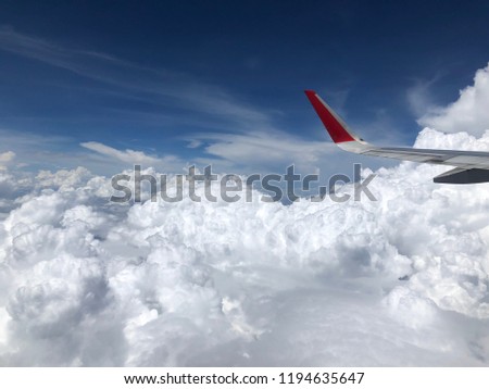 beautiful clouds under the wing